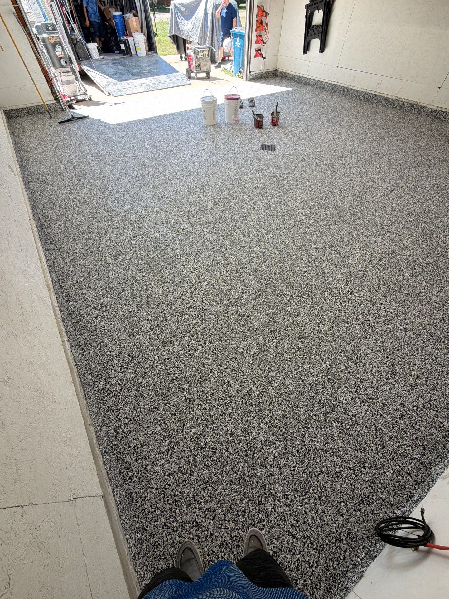 Custom Speckled Epoxy Garage Floor Coating in Fruitport, Michigan by Gordon Painting