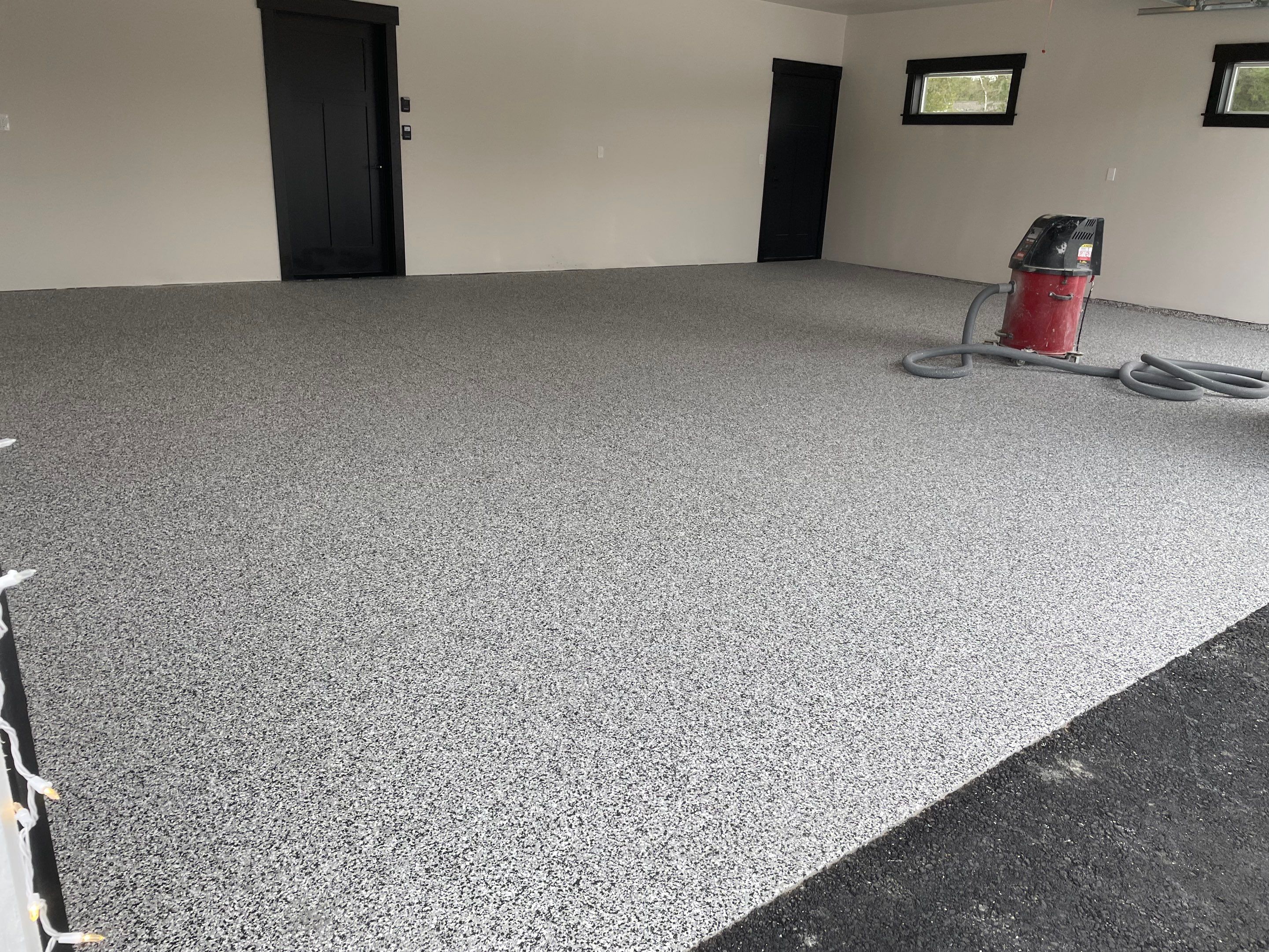 Garage Transformation using Domino and The Penntek Evolution System by Croc Coatings, LLC