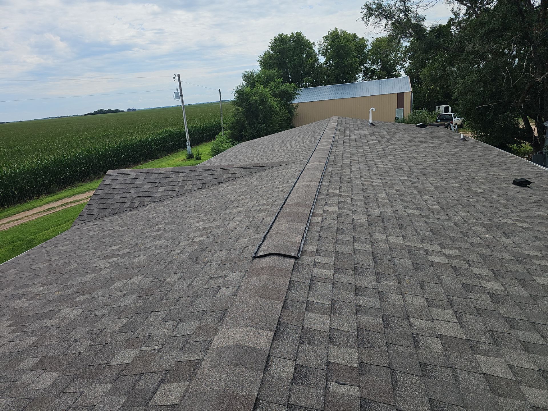 Riverdale Exterior Transformation | TAMKO Roofing & James Hardie Siding by Loyal Nine