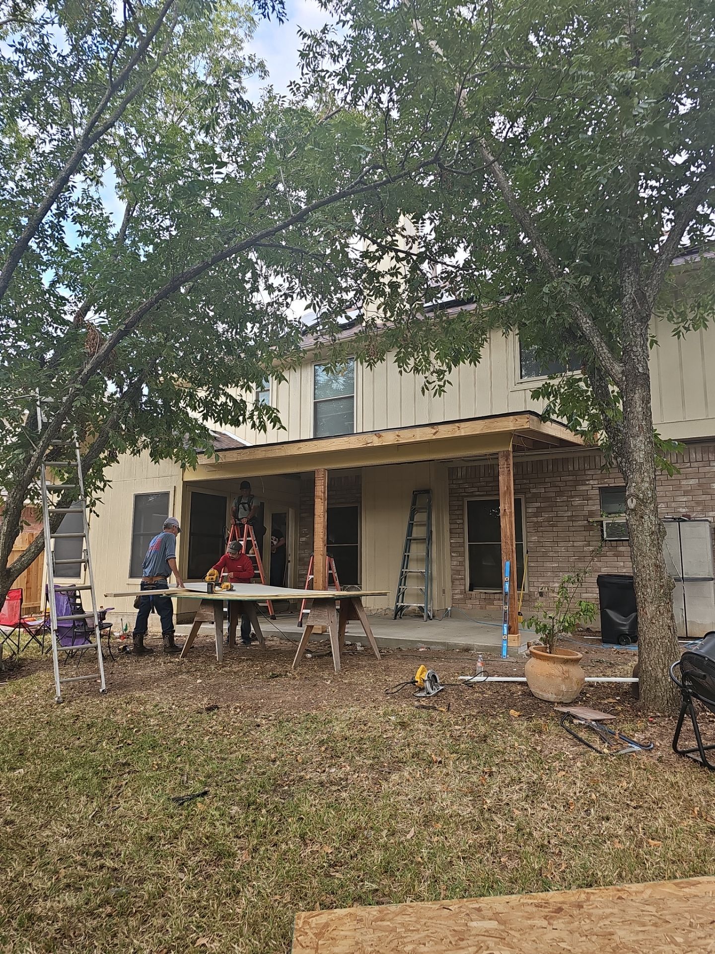 Beautiful New Covered Patio by DeZign Roofing & Exteriors
