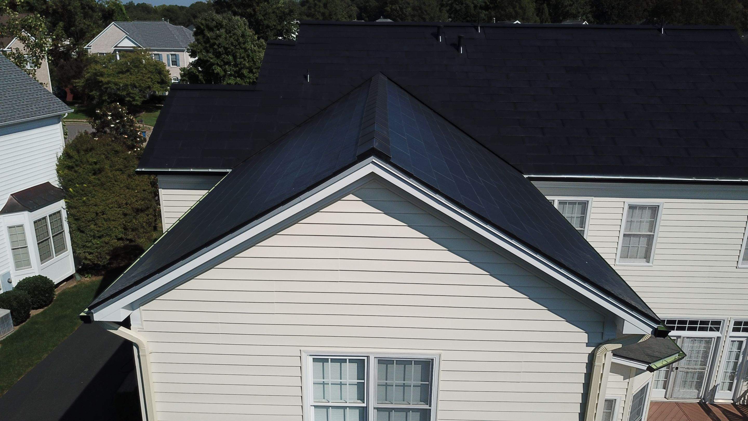 Tesla Solar Roof Replacement using Tesla Solar Roof V3 tiles by American Home Contractors