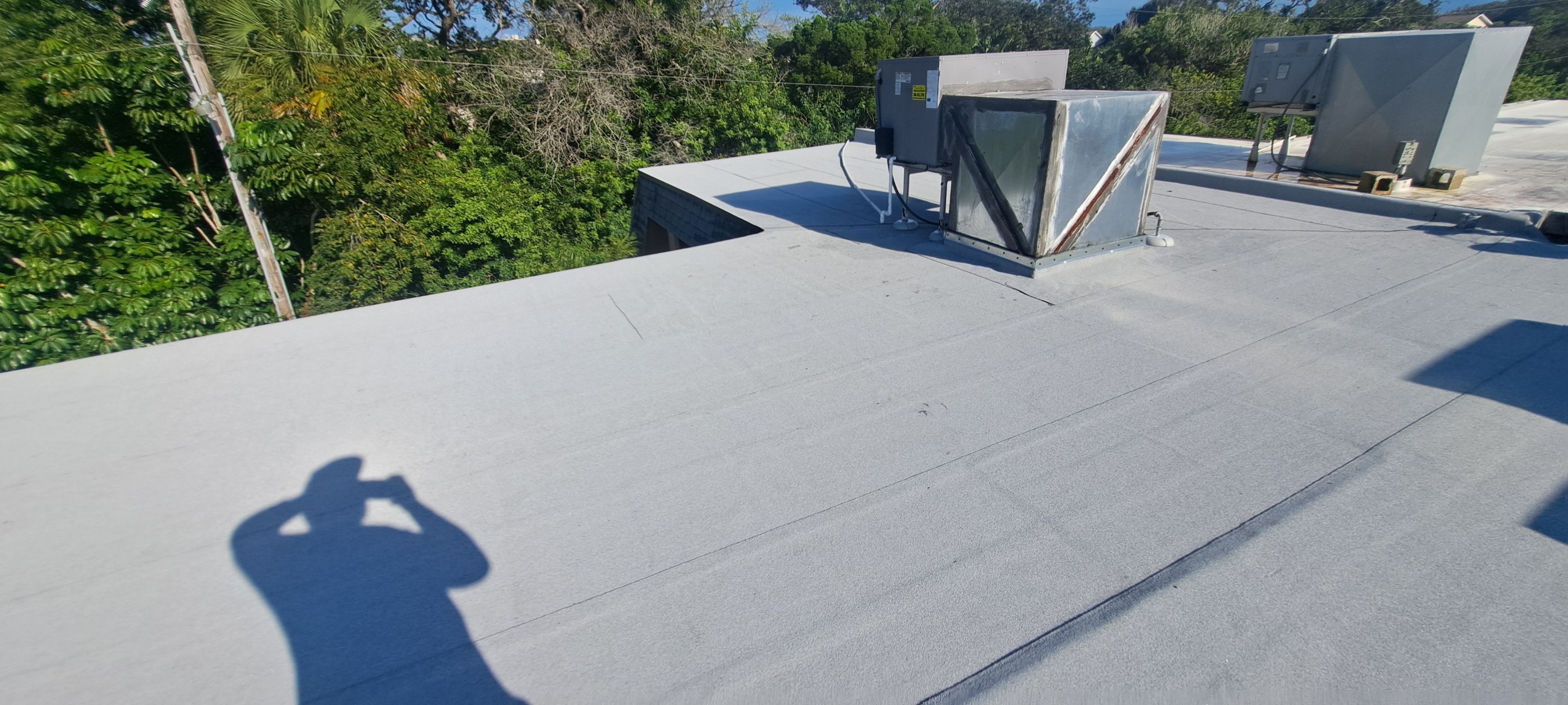 Flat Reroof Replacement New Smyrna Beach FL by Pinnacle Roofing Group