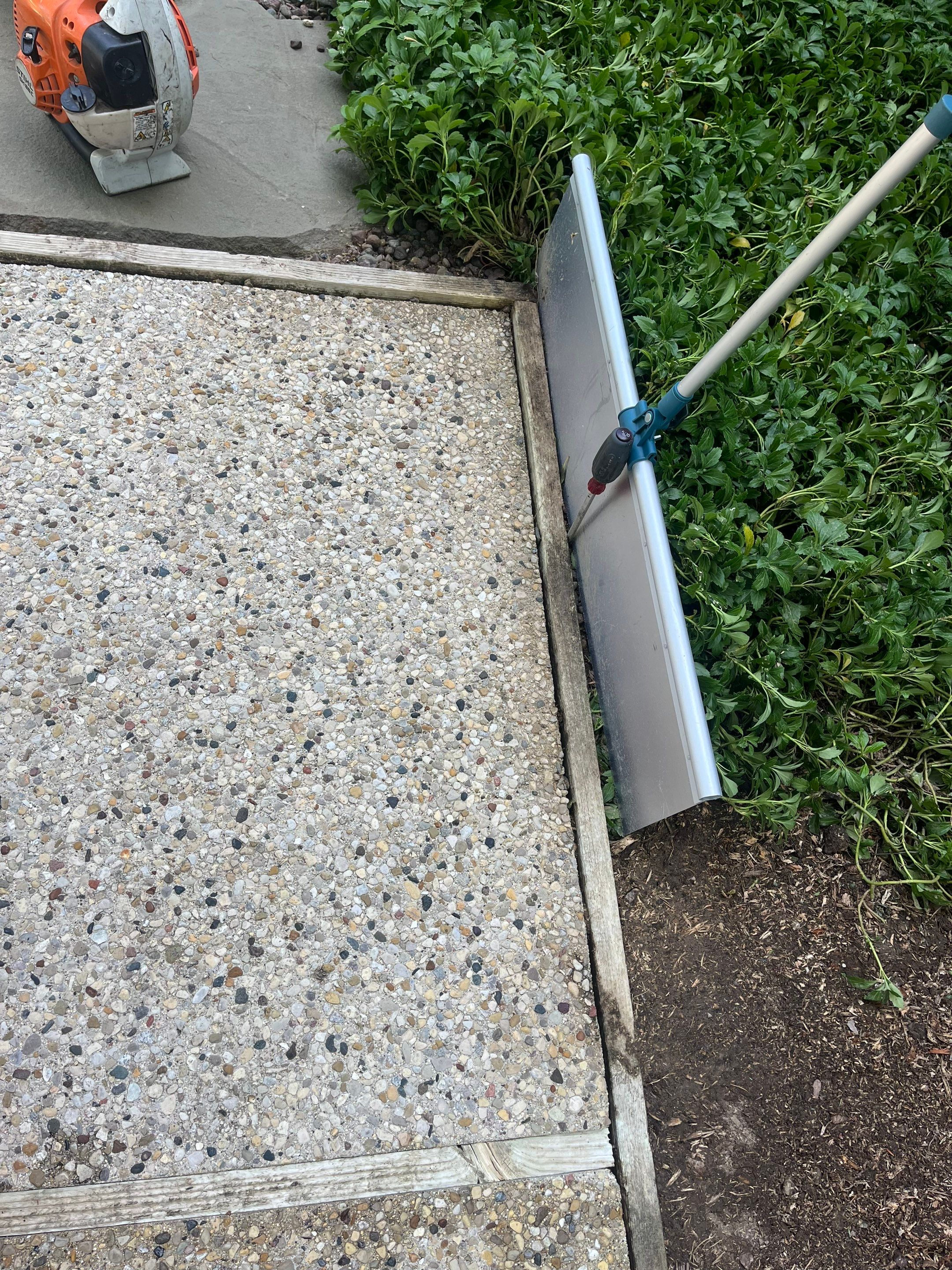 Aggregate concrete cleaning and sealing using Surebond SB-9000 by Northern Power Washing LLC.