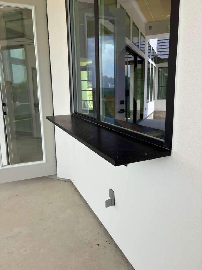 A home with a mix of quartz options by Mena stone surfaces