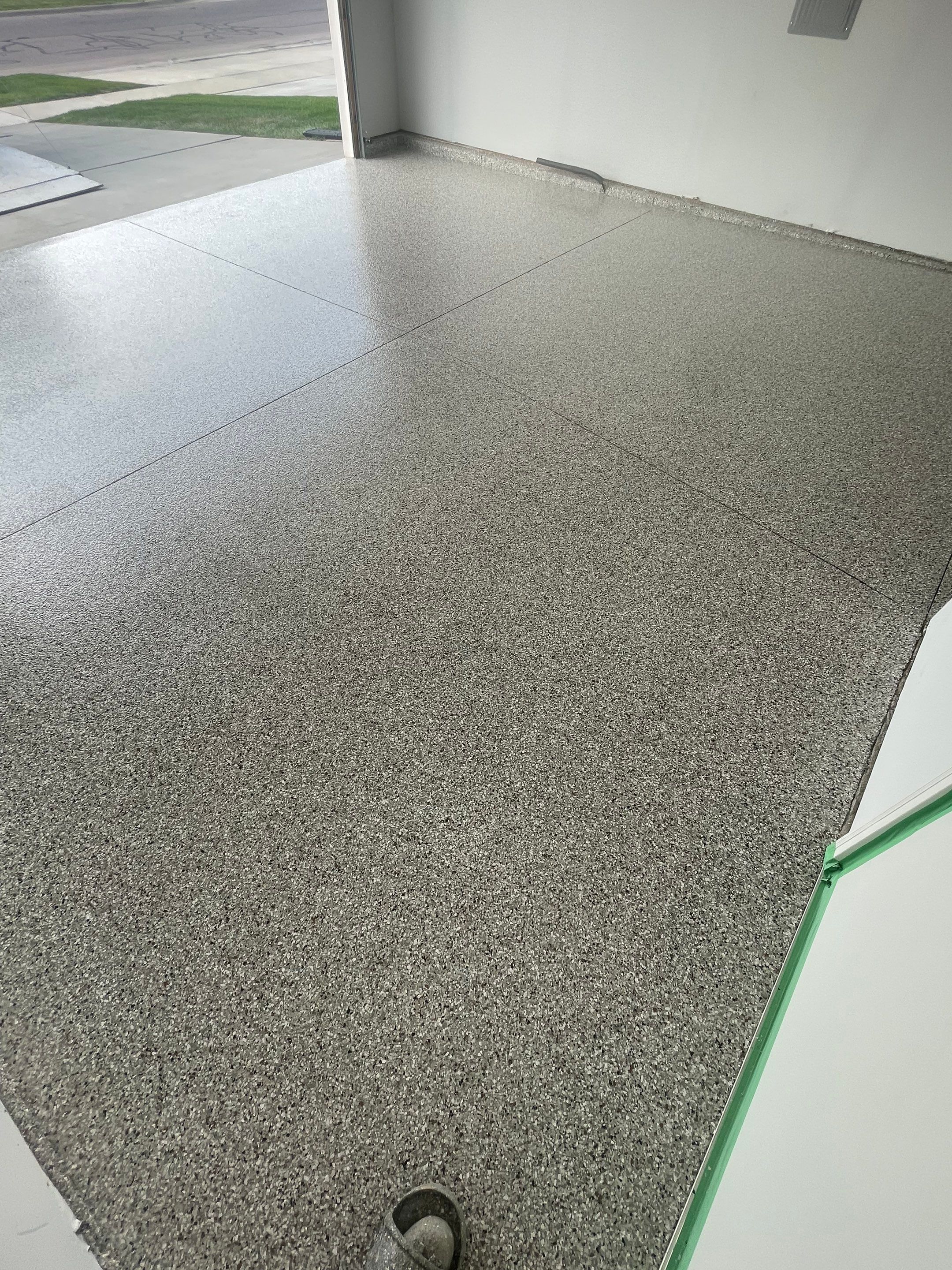 Custom Coyote Flake Garage Floor Coating in Sioux Falls by Select Painting, Coatings & Garage Cabinets
