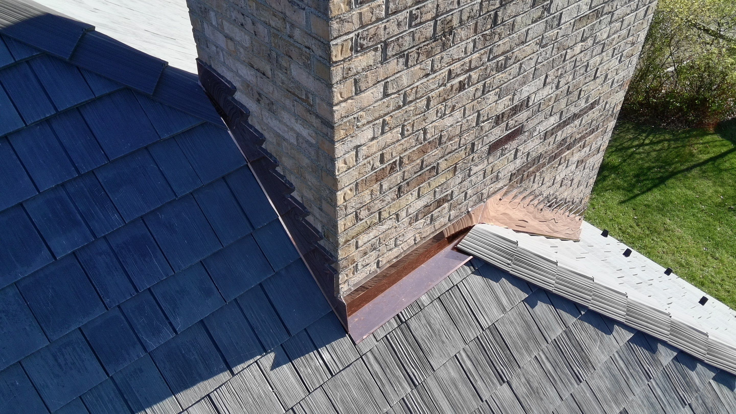 Re-roof: Synthetic Shake & Custom Copper by Midwest Building Solutions