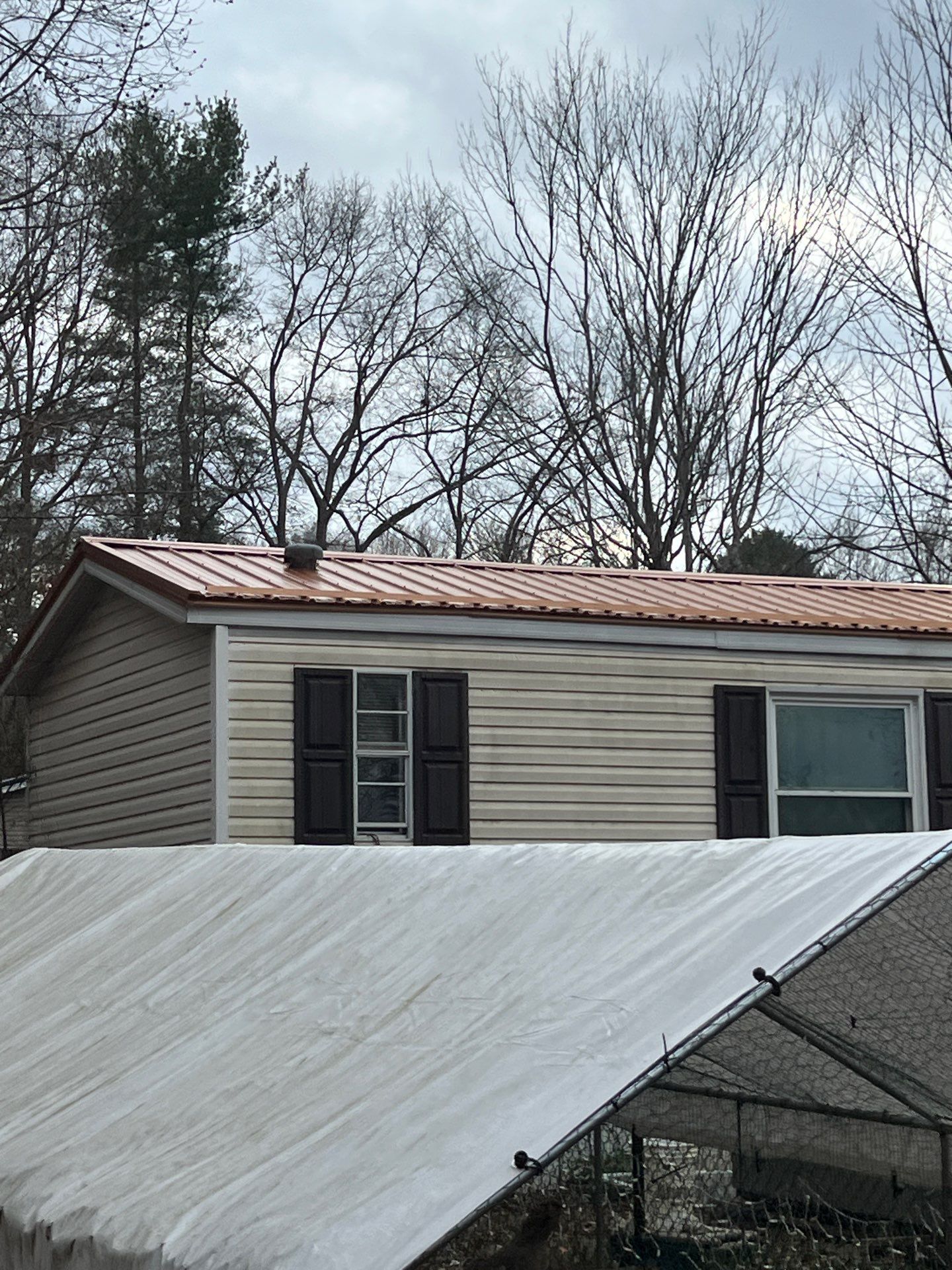 Ross Residence by Omnia Roofing