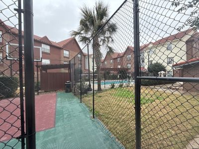 5' Wrought iron fencing w/ 10' vinyl chainlink