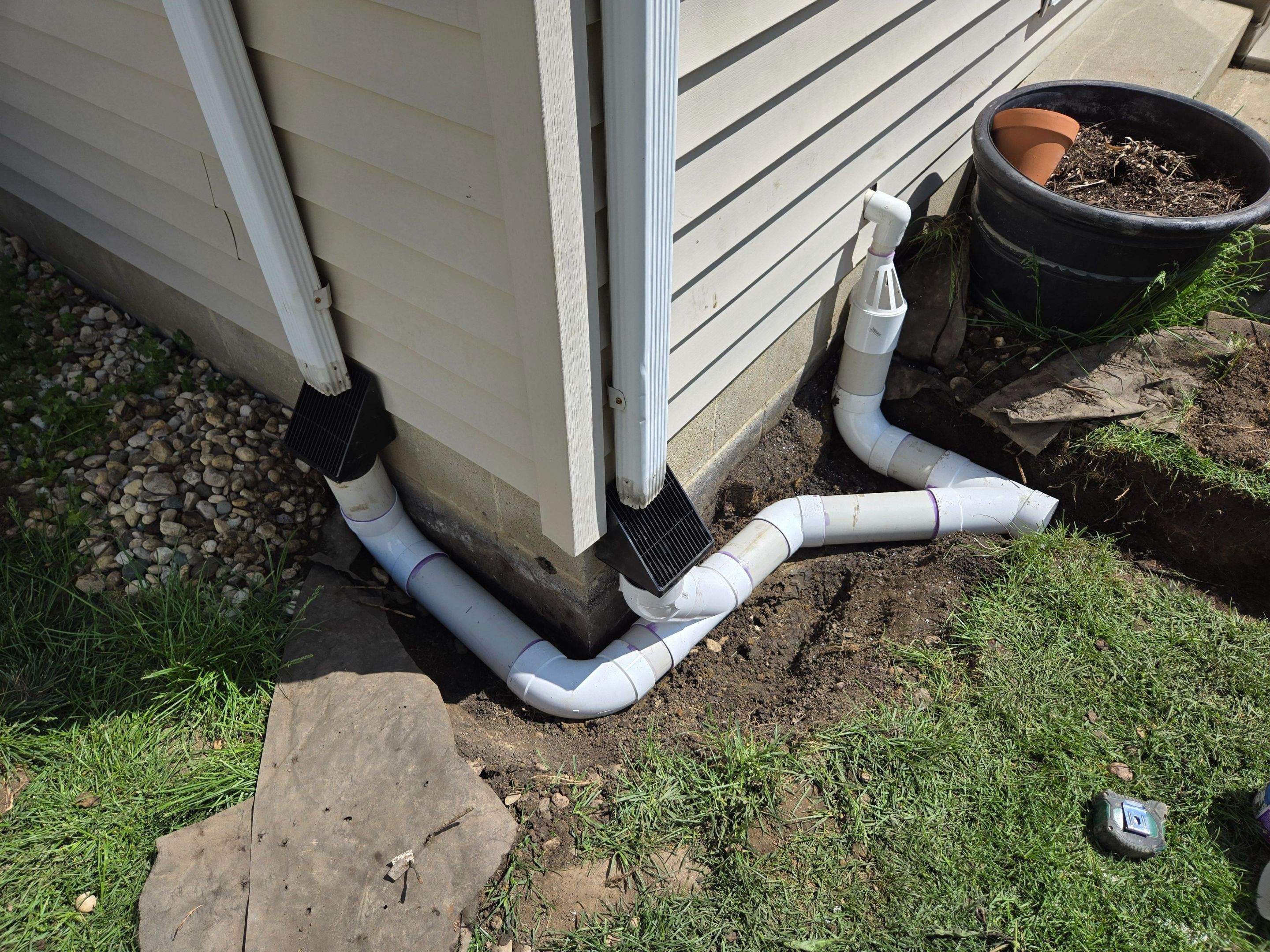 Downspout Discharge and Versatile Water Movement System by Allied Water Services