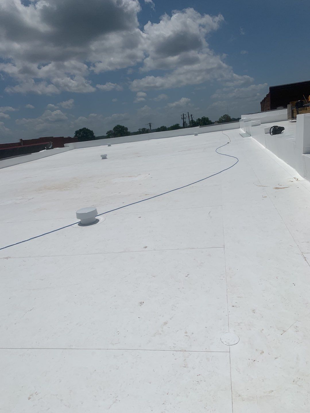 Commercial Roofing Installation in DeQueen, AR, using 50 mil PVC by Hostetler Roofing