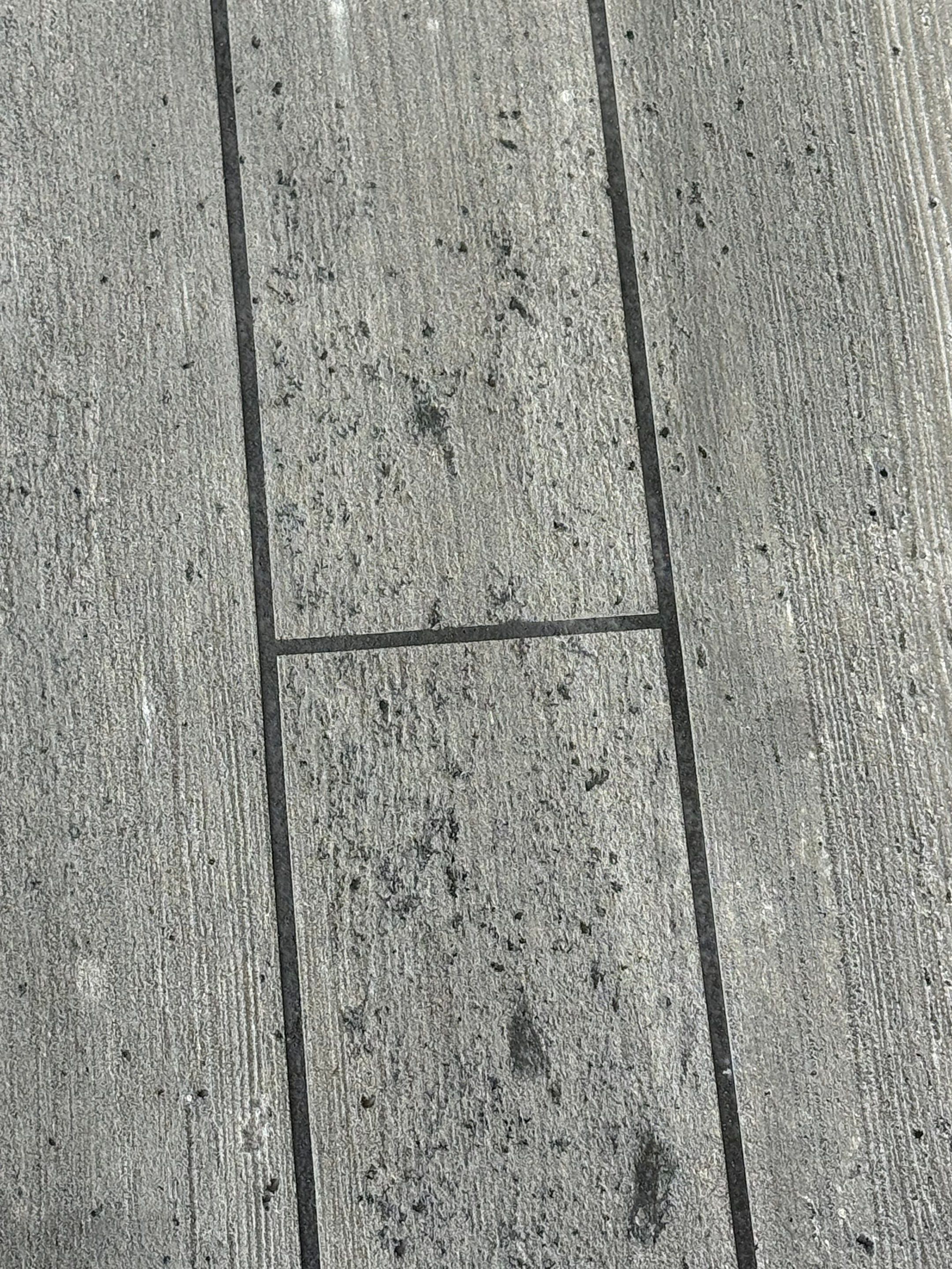 Wood-Grain Stenciled Concrete Porch Resurfacing in Mobile by Cornerstone Hard Surface Restoration 