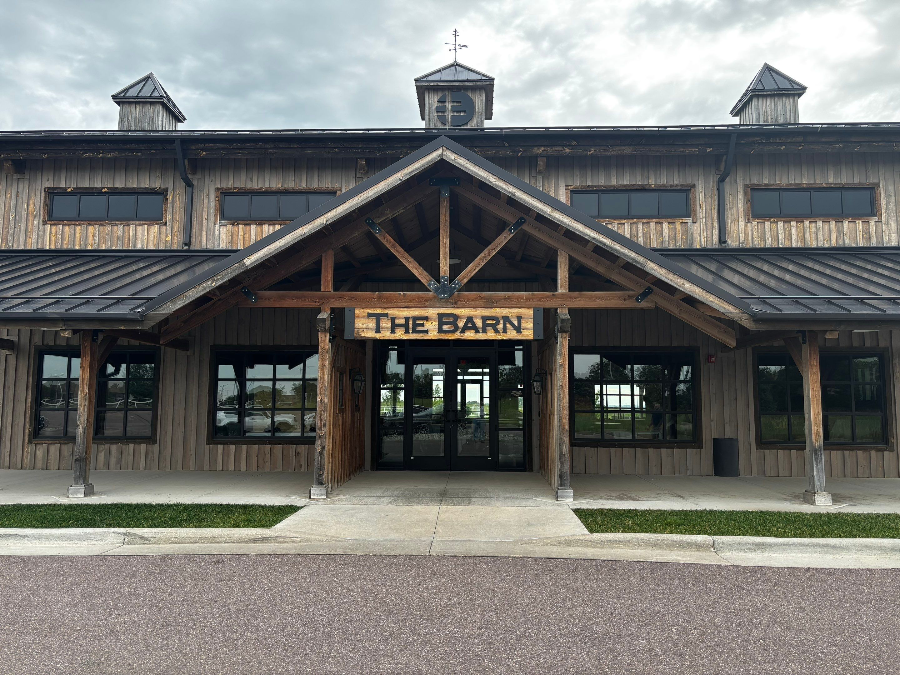Commercial Exterior Wood Staining for Sanford Barn in Sioux Falls by Select Painting, Coatings & Garage Cabinets