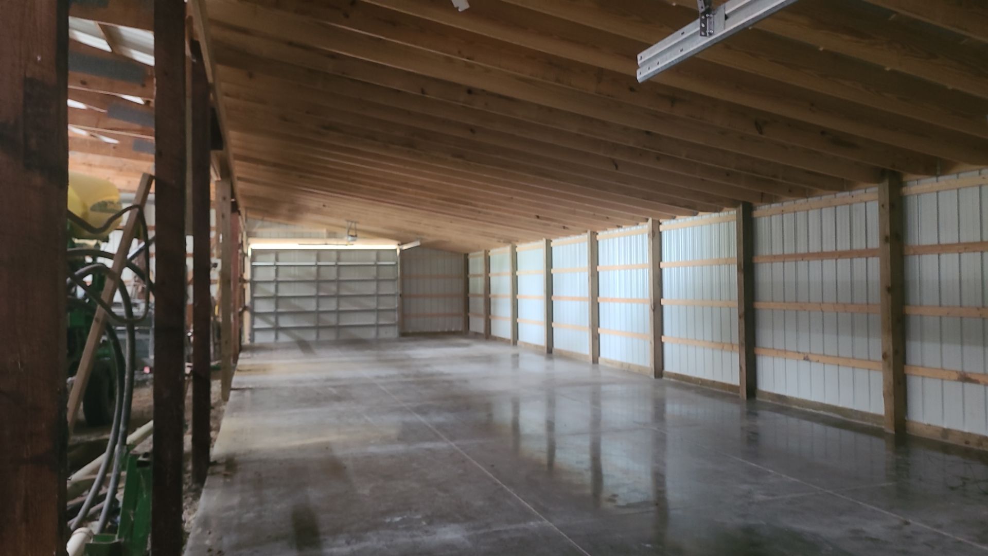 Reskin pole barn and add lean-to by Dagny Builders