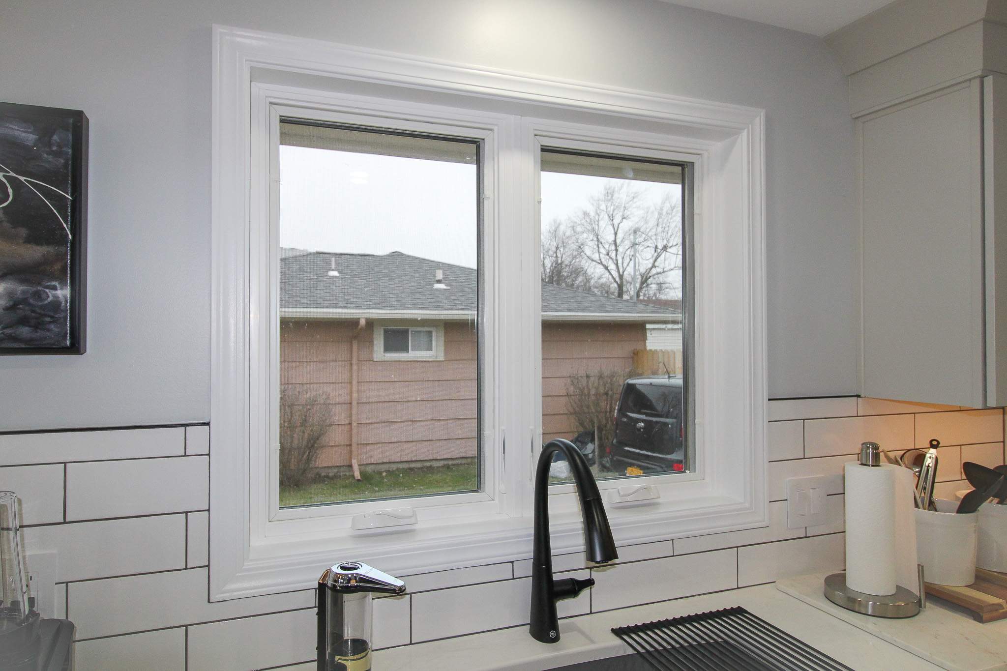 Interior Renovations, Kitchen Remodel, and Window Replacement by Ivy Lea Construction
