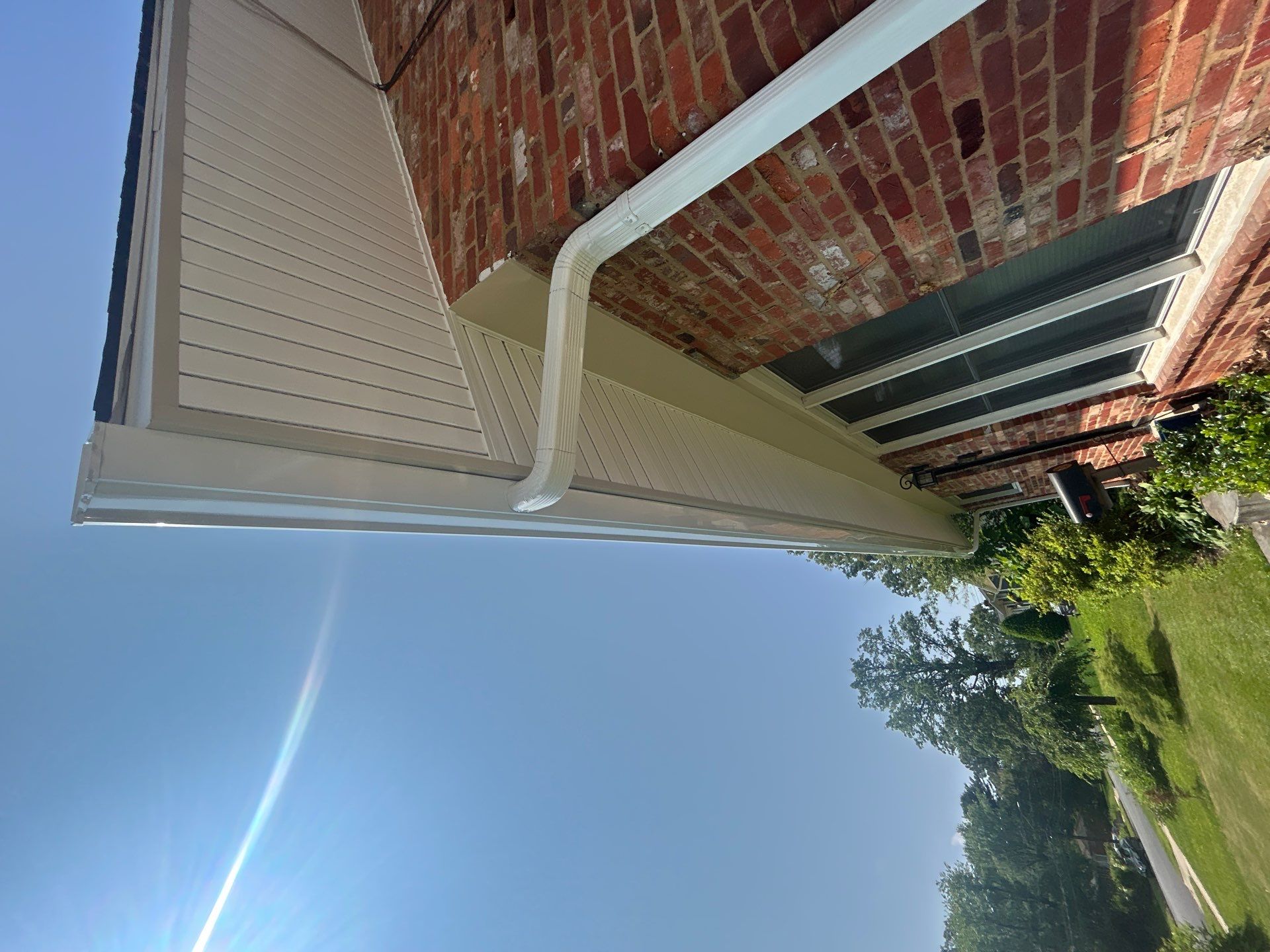 Fairfax: Residential Siding Replacement with CertainTeed 8" Board and Batten Siding in Desert Tan by RM Banning, Inc.