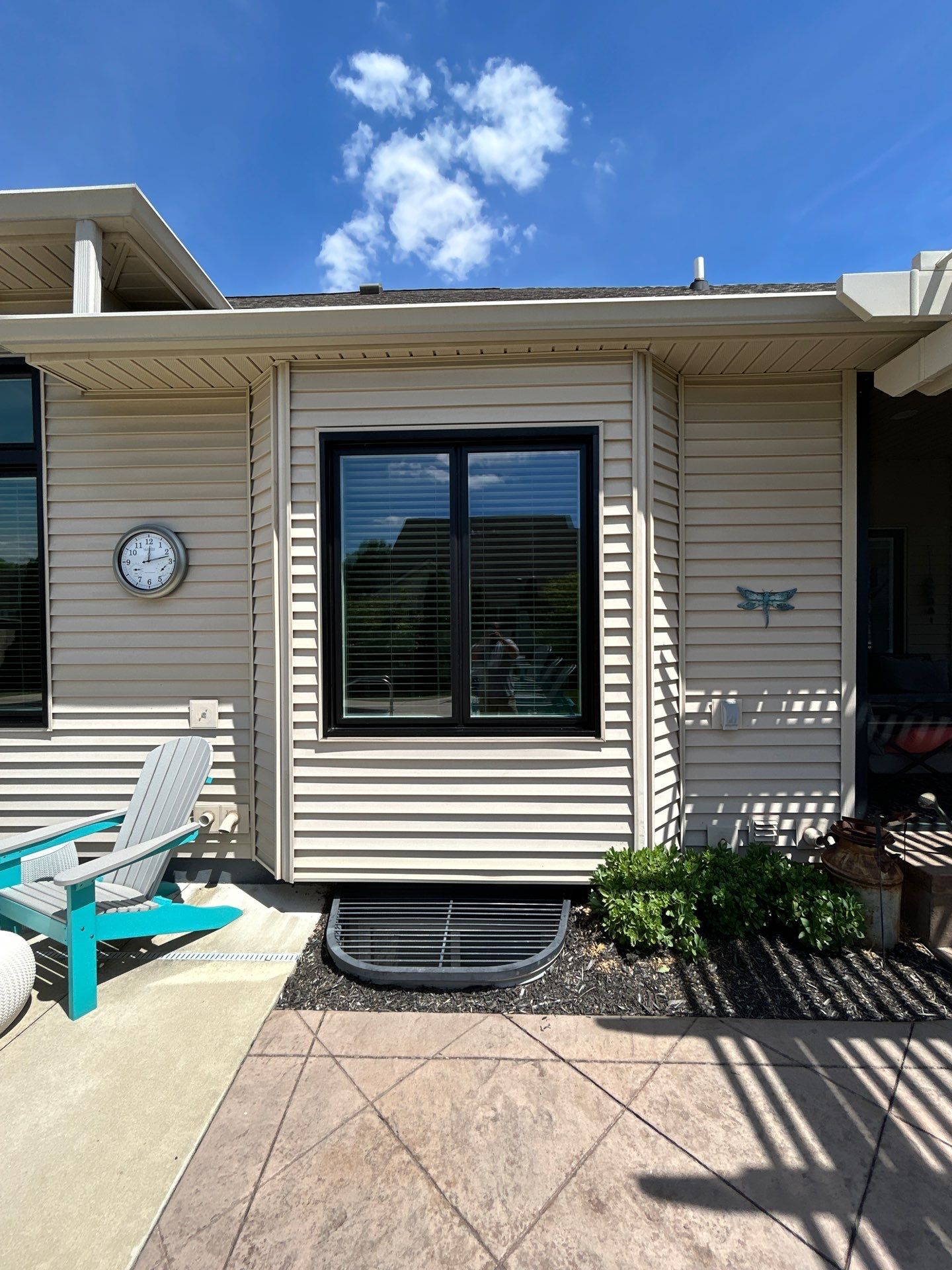 Black Vinyl Window Installation by Merrifield Exteriors, LLC