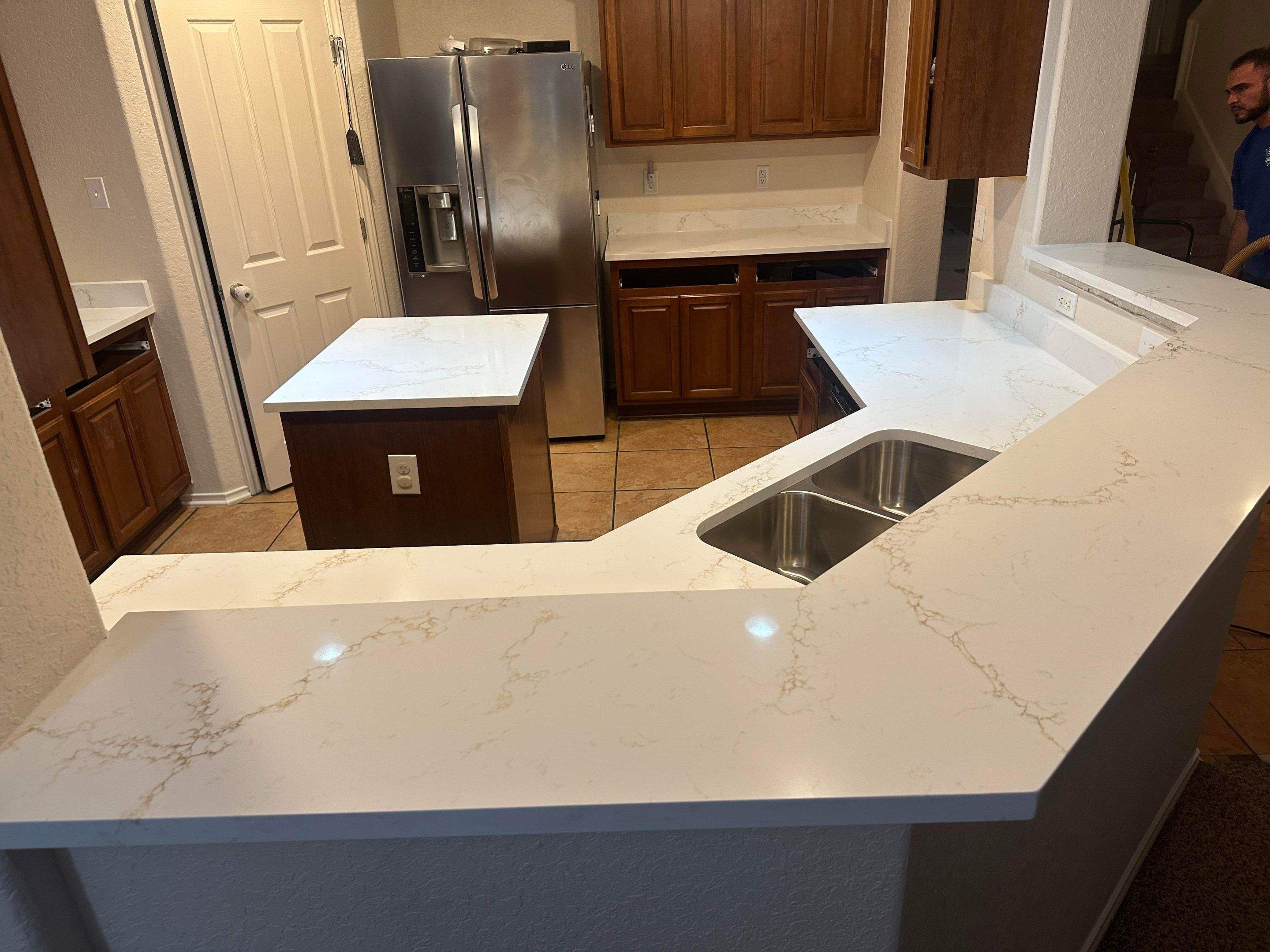 Rainier Gold White Quartz Countertop Installation and Kitchen Upgrade by Mena stone surfaces