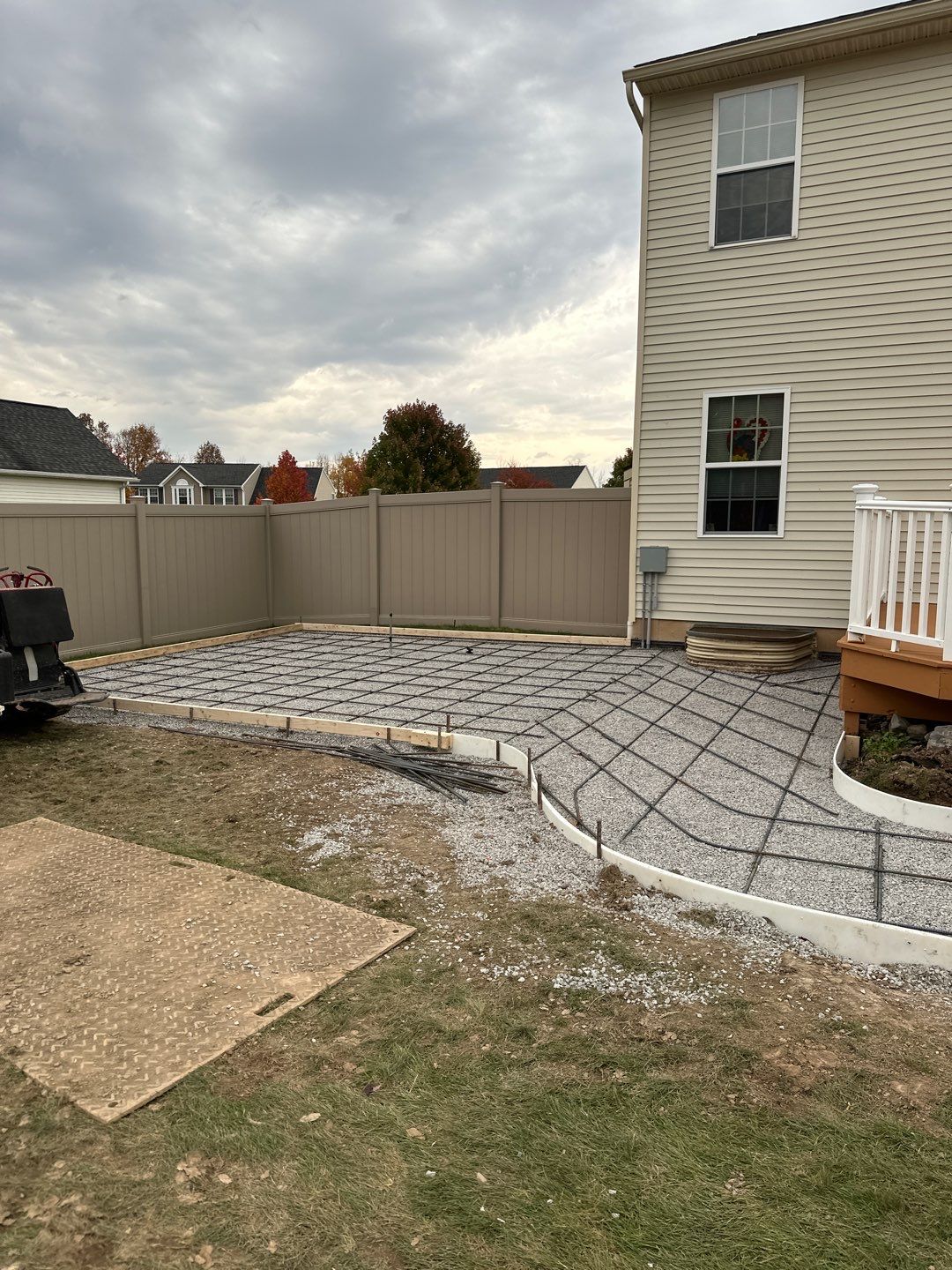 Oxford Slate stamped concrete patio  by NG Masonry & Construction LLC