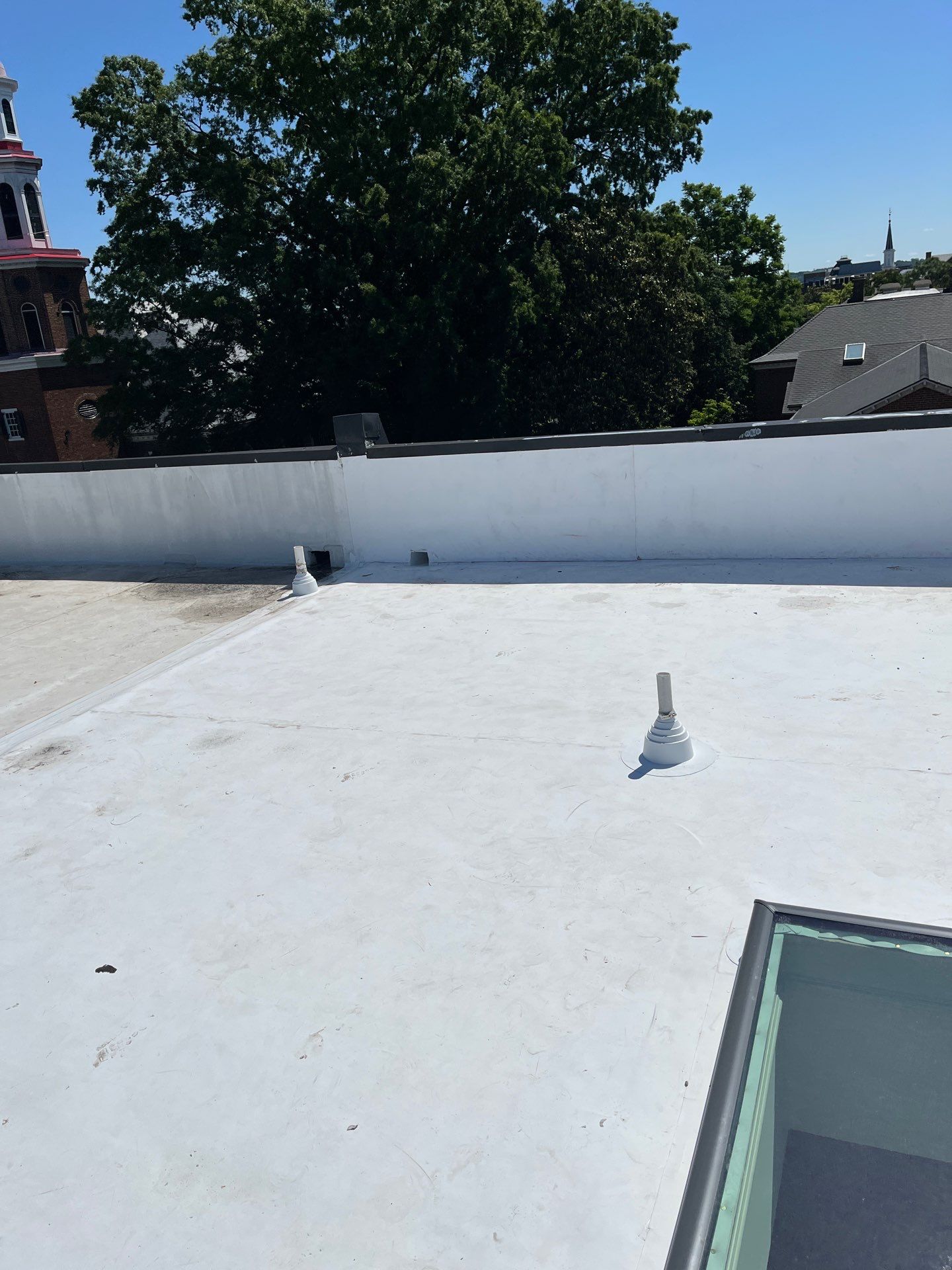 Alexandria: Carlisle Syntec TPO Flat Roof Installation by RM Banning, Inc.
