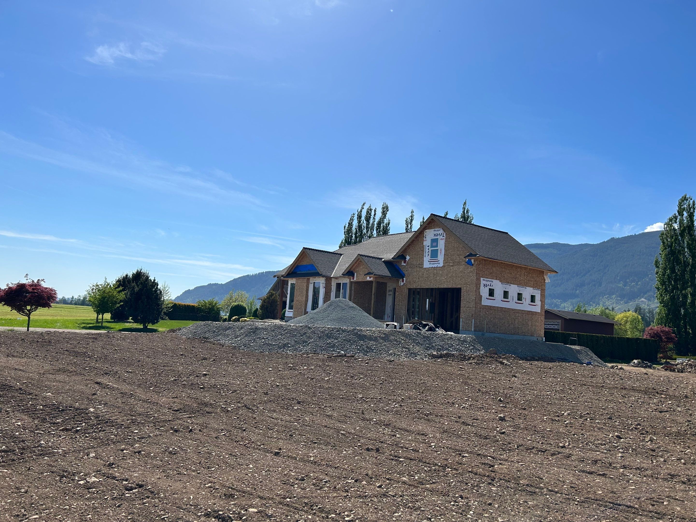 Residential Roofing Installation upgraded venting and hip and ridge capping by Top Notch Roofing Inc