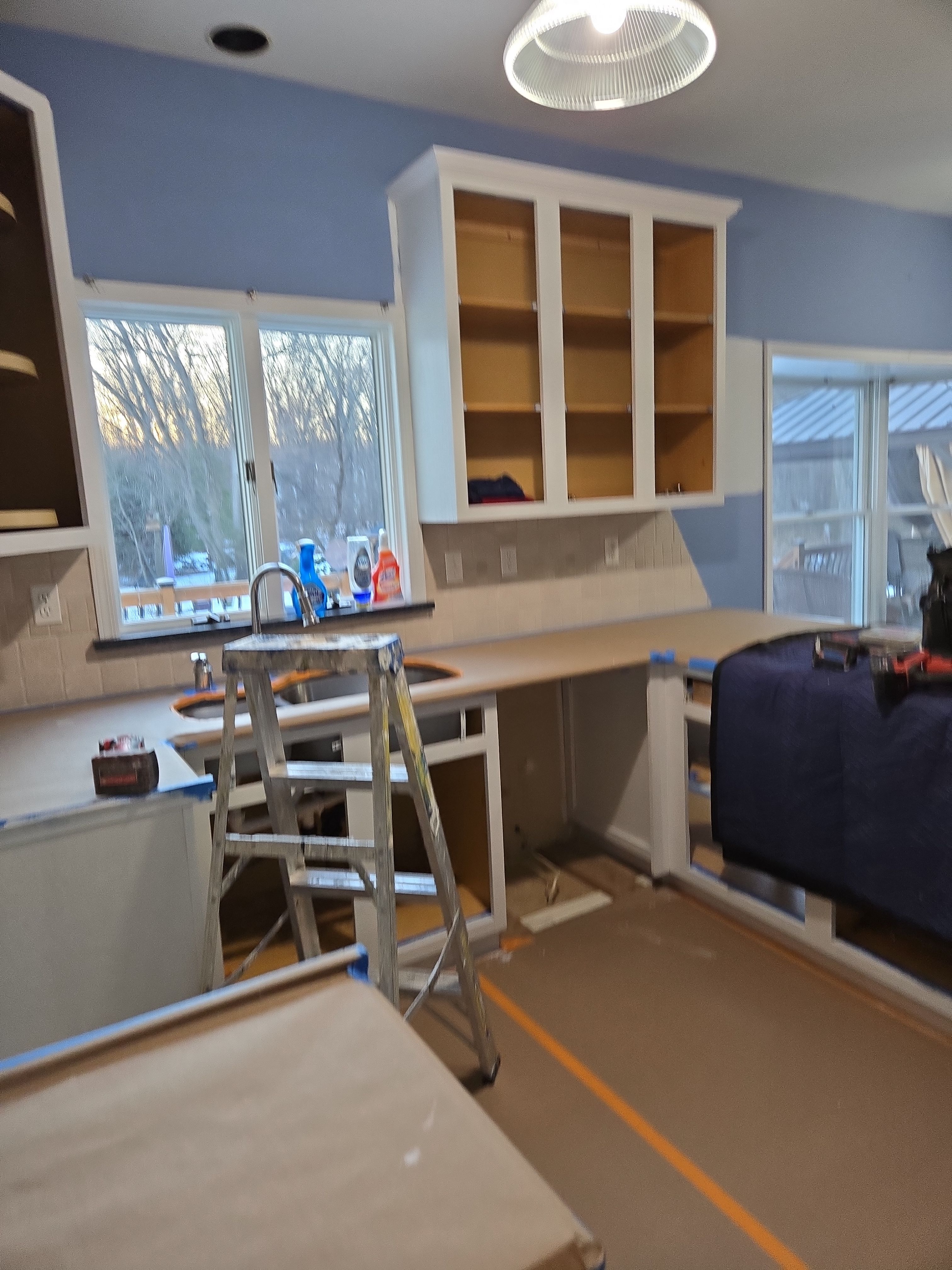 Cabinet Refinishing using Benjamin Moore Command by Spectrum Painting, LLC