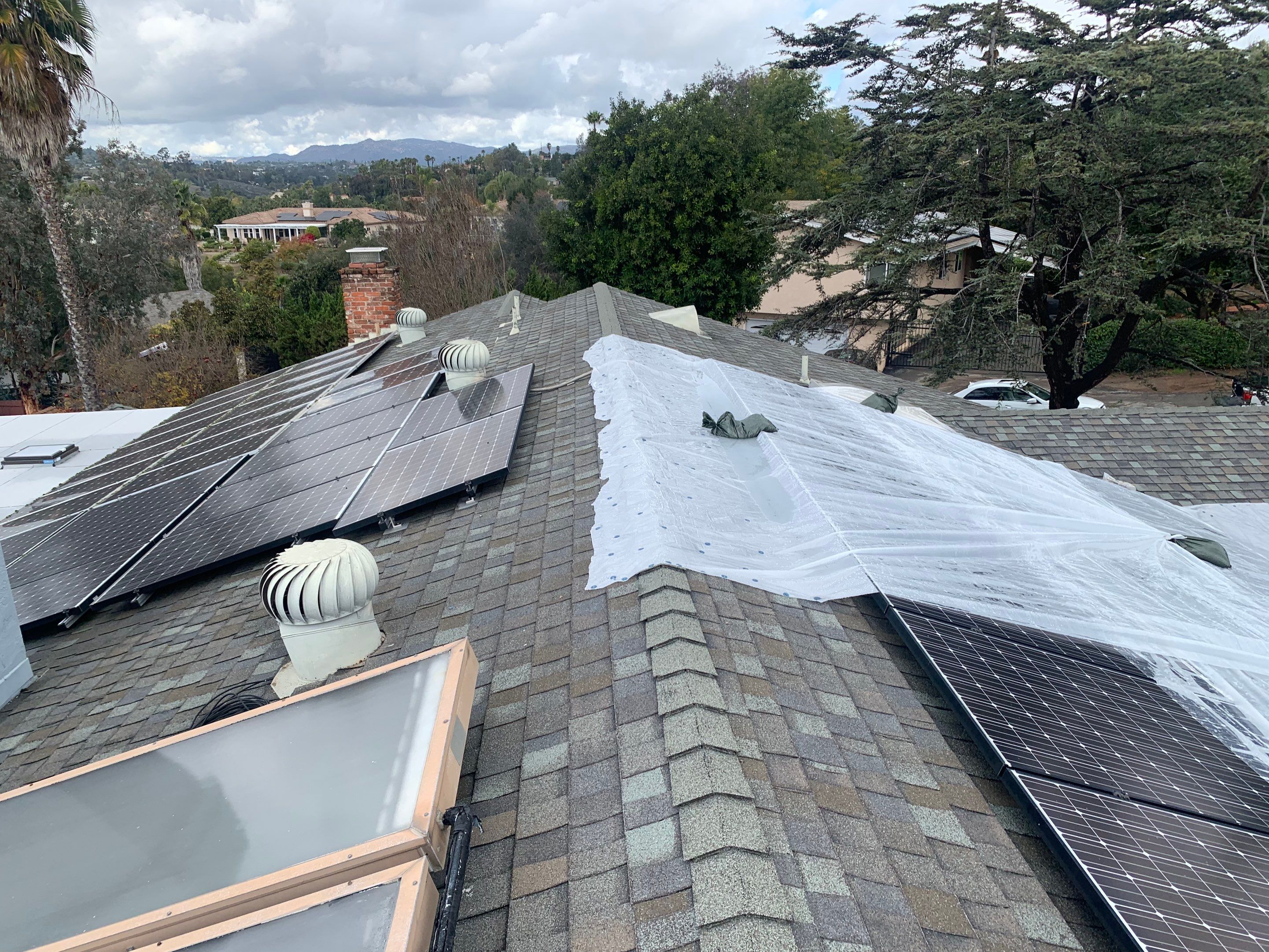 Escondido Shingle Roof Replacement After Solar Stanchion Leak Damage by Zenith Roofing Services