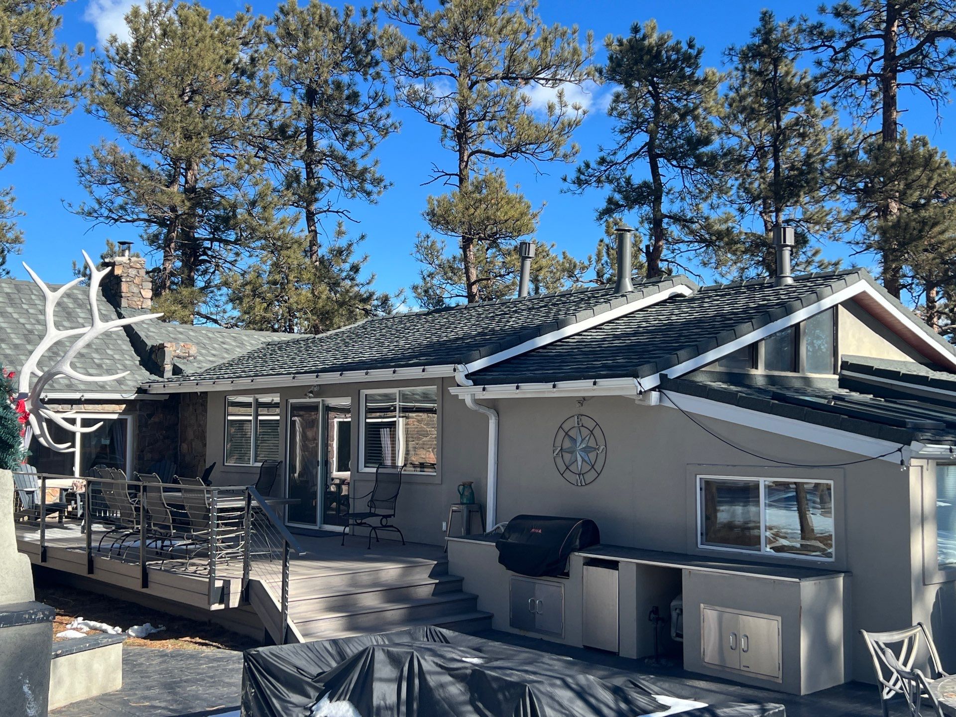 Residential Roofing Installation using Stone Coated Steel by Blue Peaks Roofing LLC 