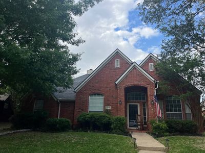 Red brick with Malarkey Midnight Black 