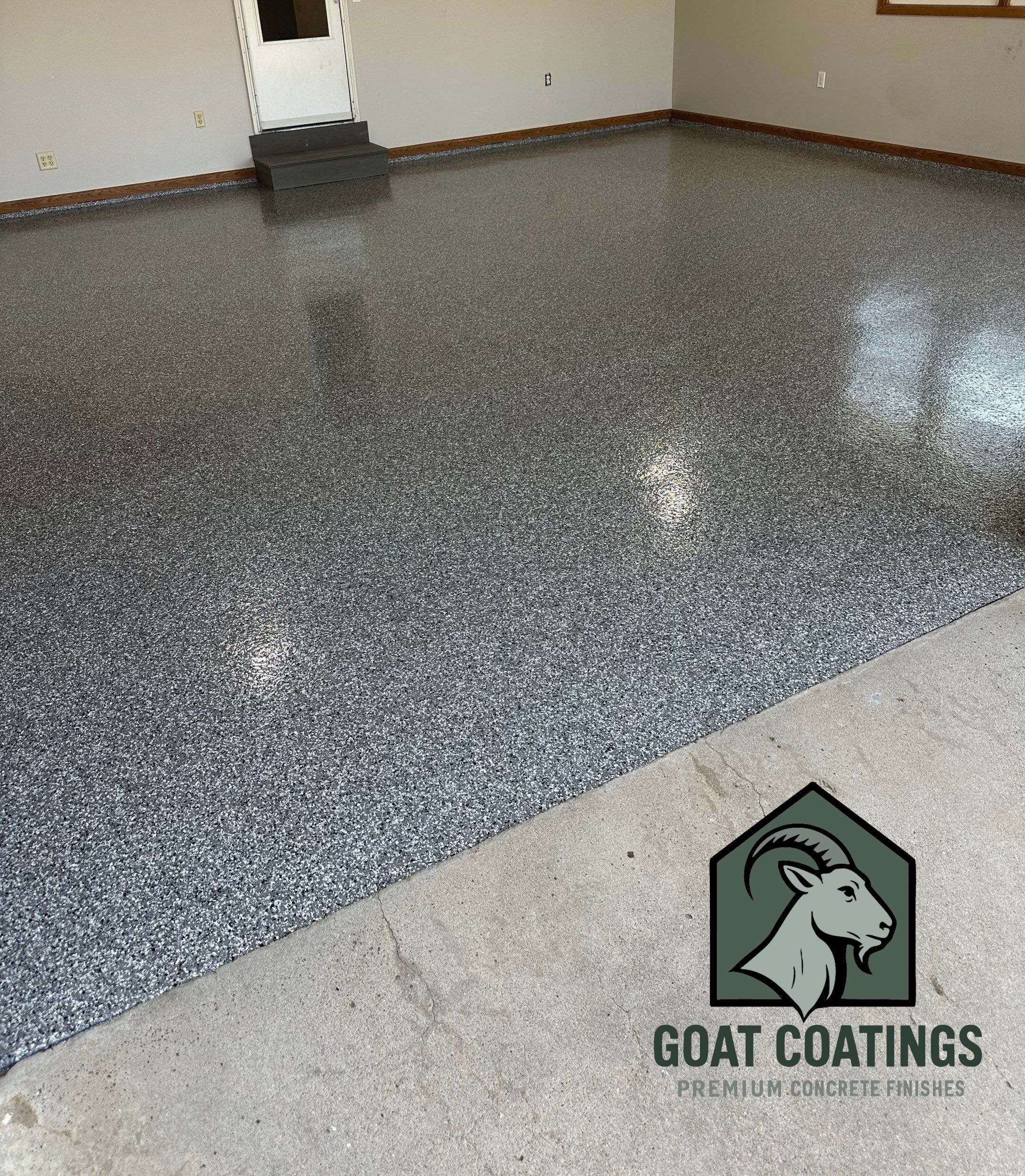 Epoxy Garage Floor Transformation and Concrete Repair in Beatrice