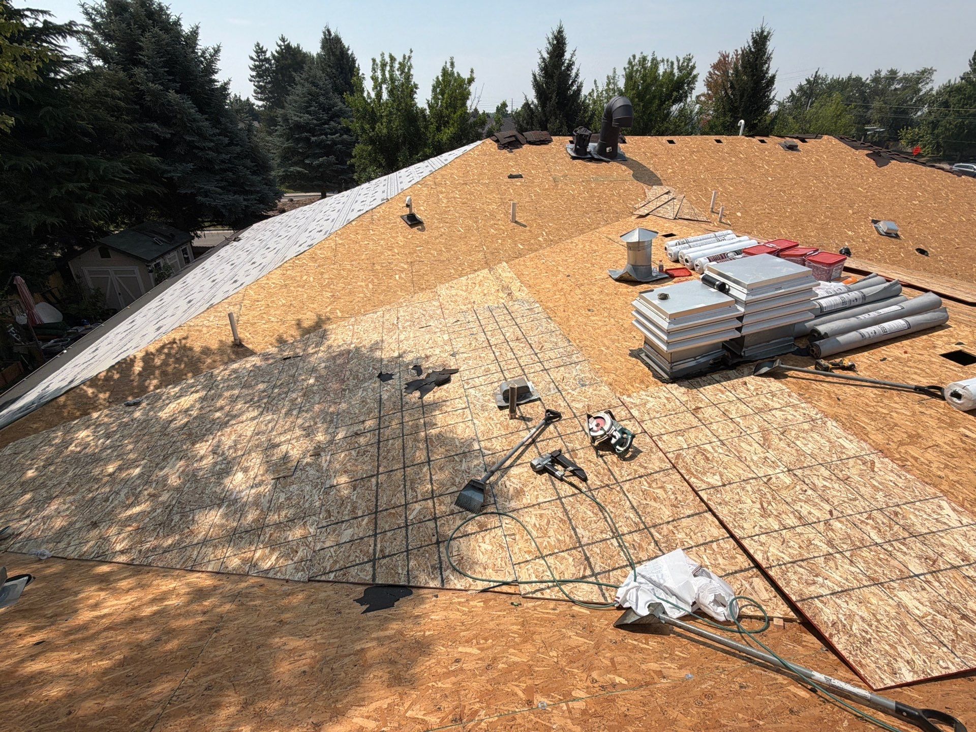 Boise Commercial Roof Replacement with Brown Architectural Shingles by Olive Roofing
