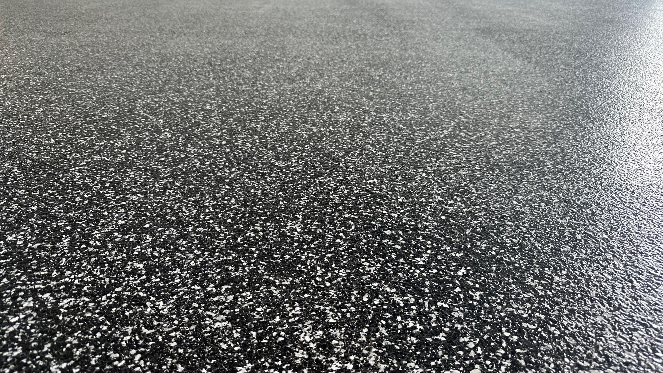 John H. received his dream garage with cabinets and a Banner Garage Floor by Banner Garage