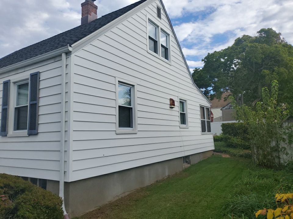 Siding Installation using Certainteed Monogram Charcoal Gray by A Plus Exterior