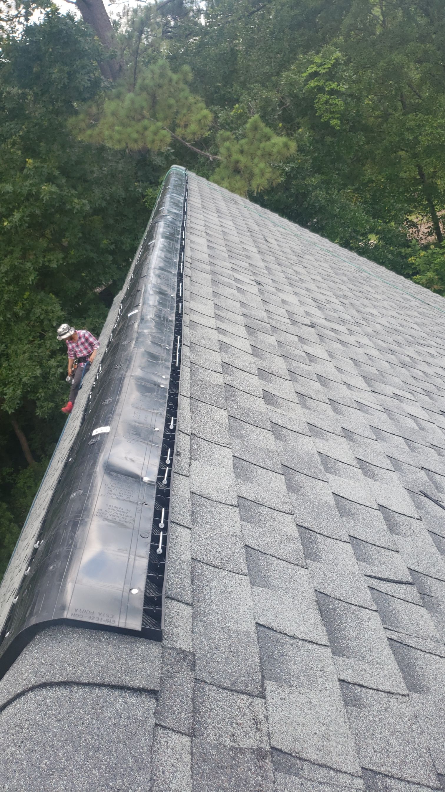 Residential Roofing Installation using Roof Replacement by American Roofing & Construction LLC