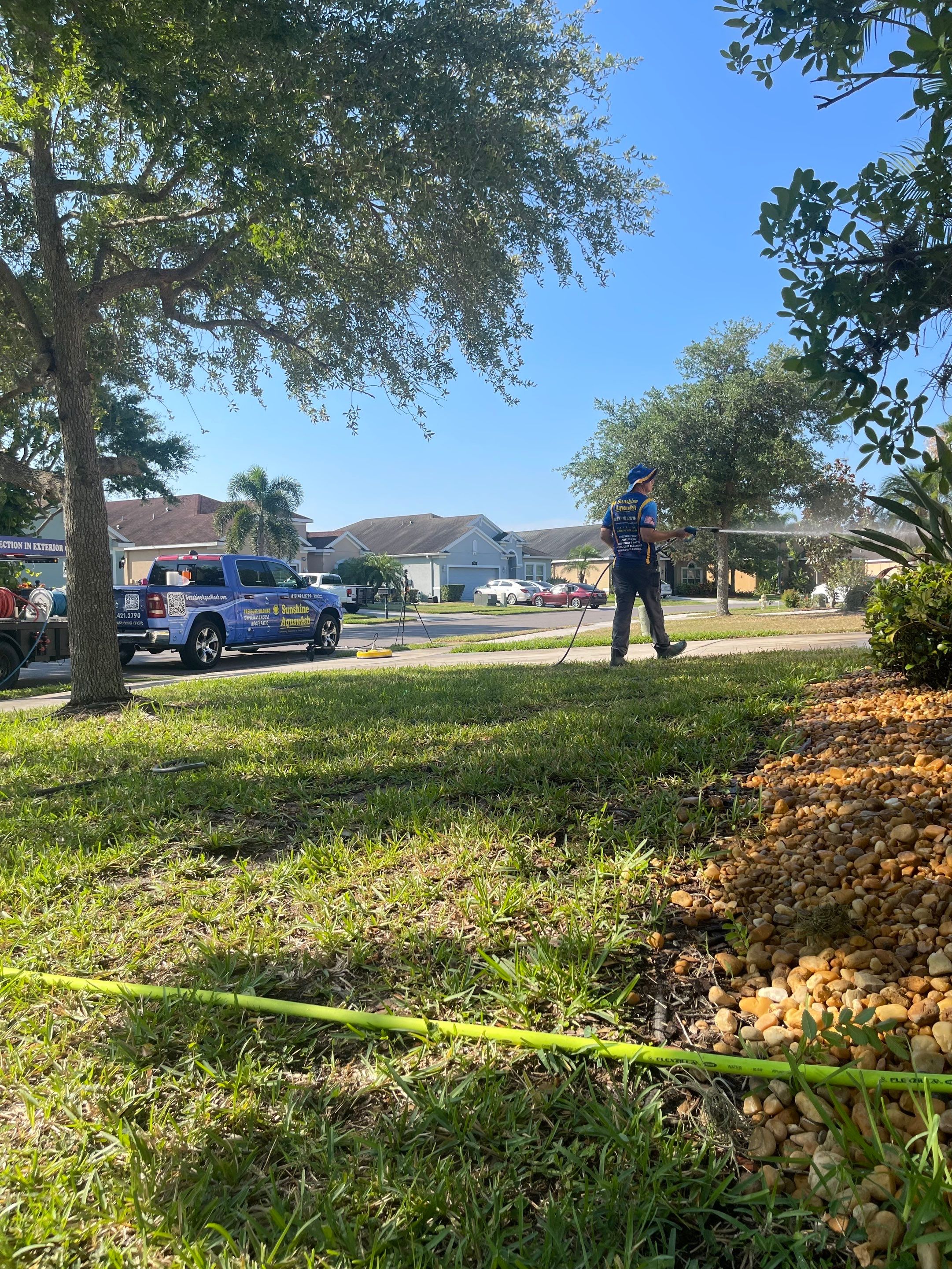 Asphalt Shingle Roof Soft Wash Cleaning & Concrete Pressure Washing in CopperStone Community, Parrish, FL by Sunshine AquaWash