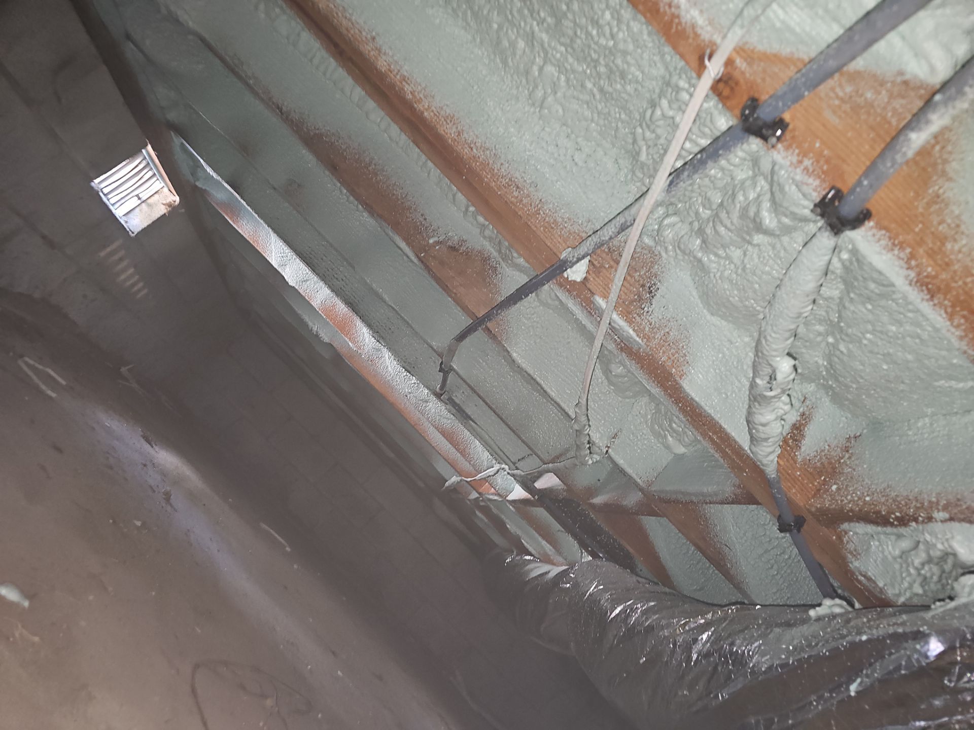 Attic Insulation using open cell spray foam by NYS Foam & Energy