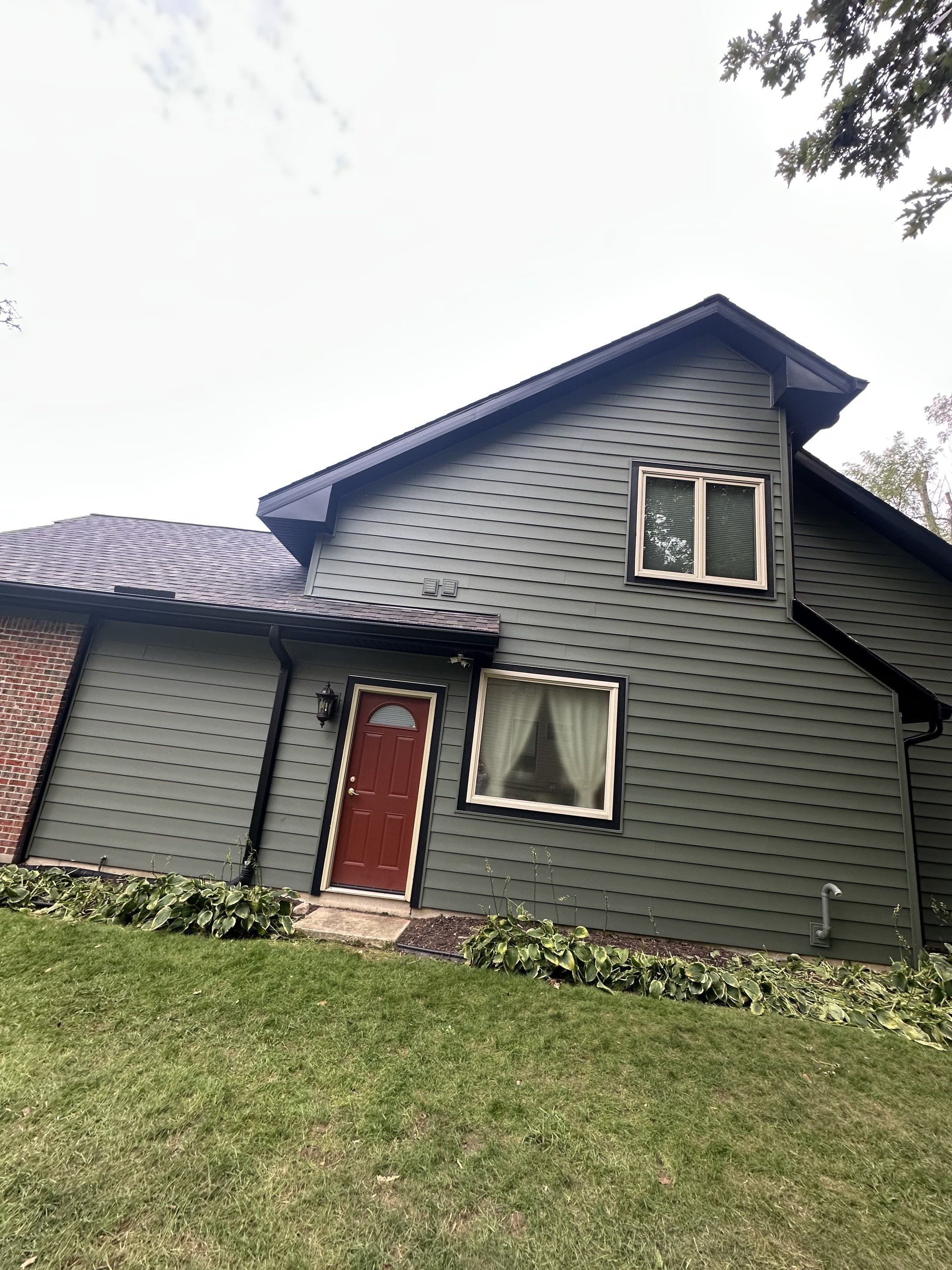Certainteed Certaplank Siding - Forest Green by Hoel Roofing & Remodeling