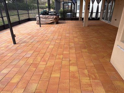 Paver Sealing for Herringbone Driveway and Screened Lanai in Valencia Lakes