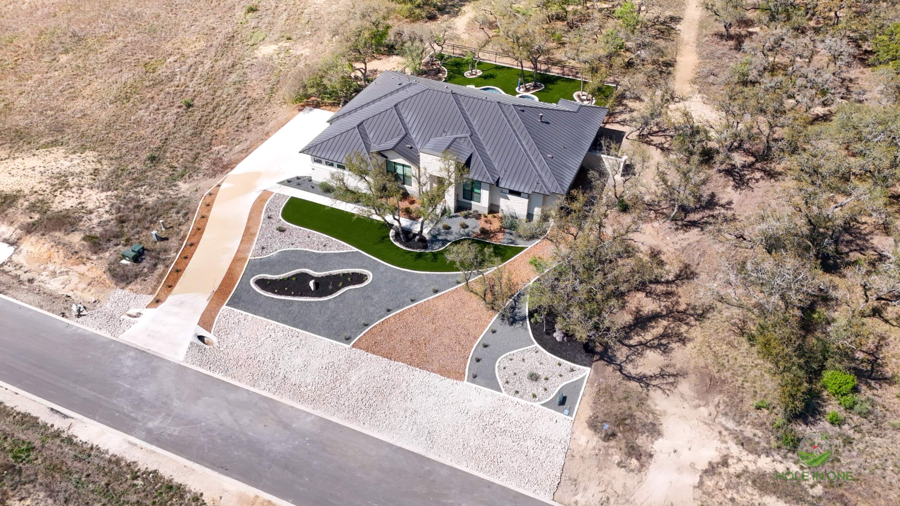 Belle Oaks, Bulverde TX by Hole In One Lawns, LLC