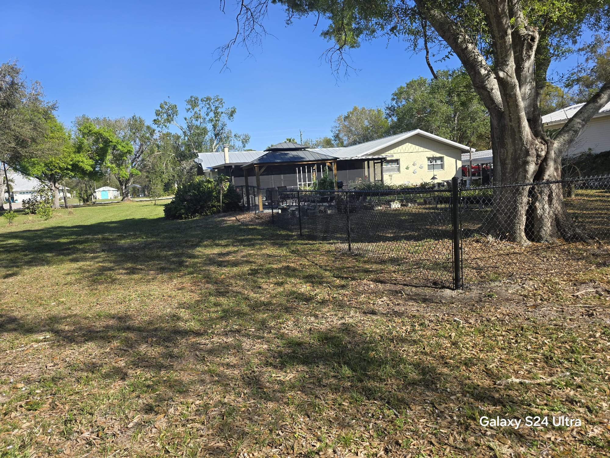 Black Chain Link Fence Installation in Port Charlotte by True Fence LLC