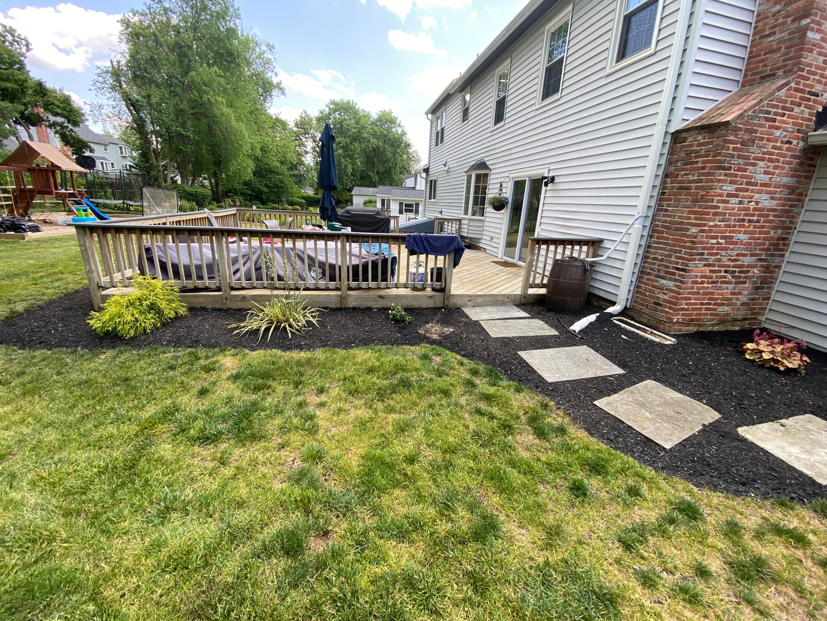 Landscape Design and Cleanup  by The Smet Companies, LLC