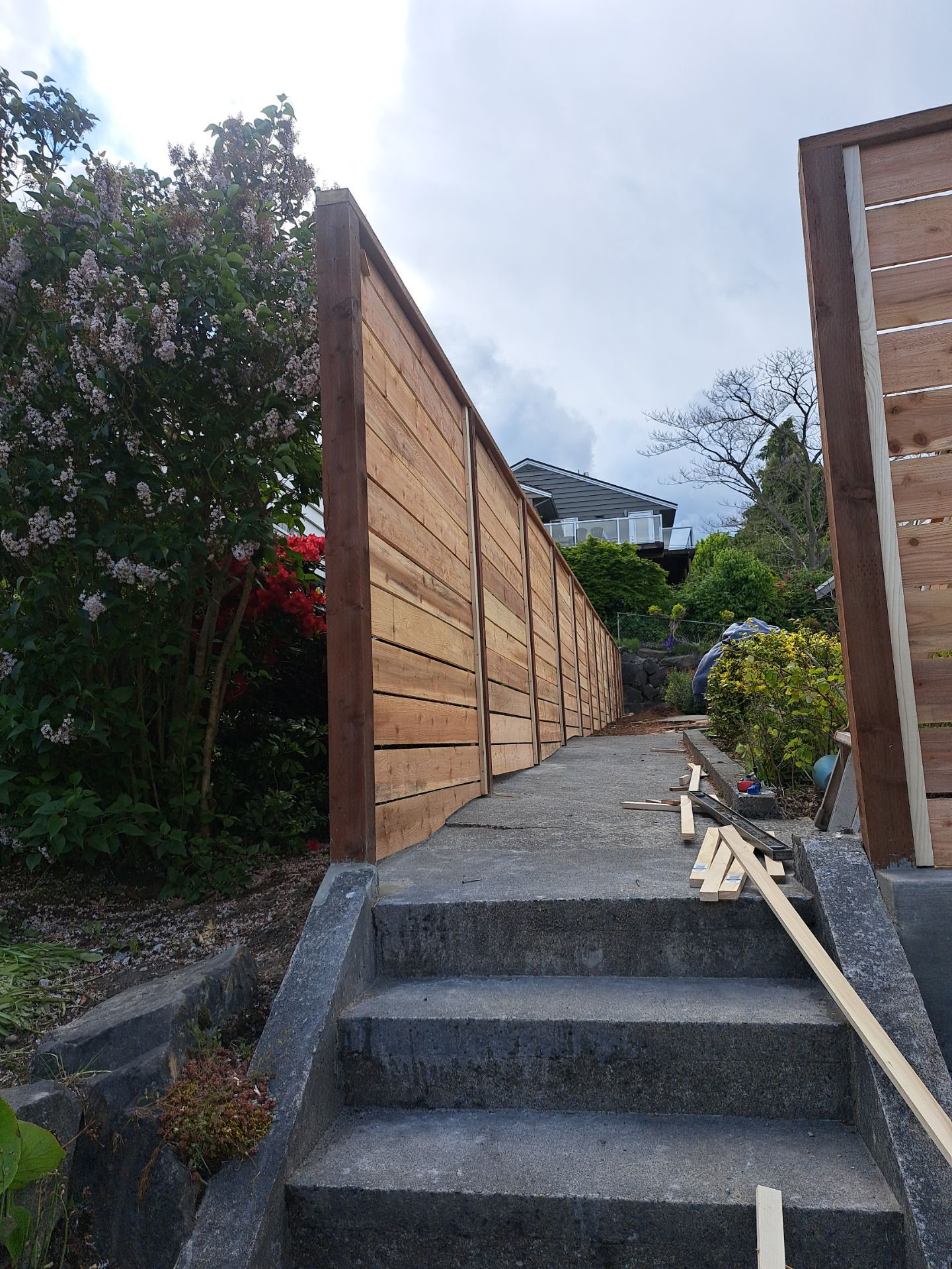 Retaining Wall & Fence Installation  by Jireh Asphalt & Concrete Inc 