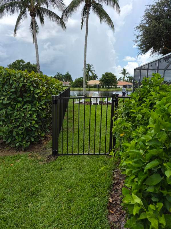 Bronze Aluminum Perimeter Fence Installation in Fort Myers by True Fence LLC