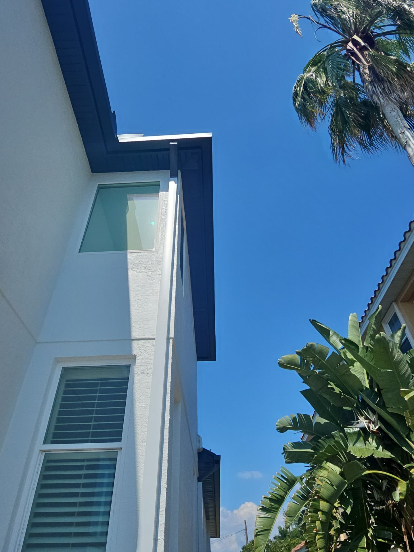 Soffit and Fascia Installation and black seamless gutters in Sarasota FL by Gutter Professors