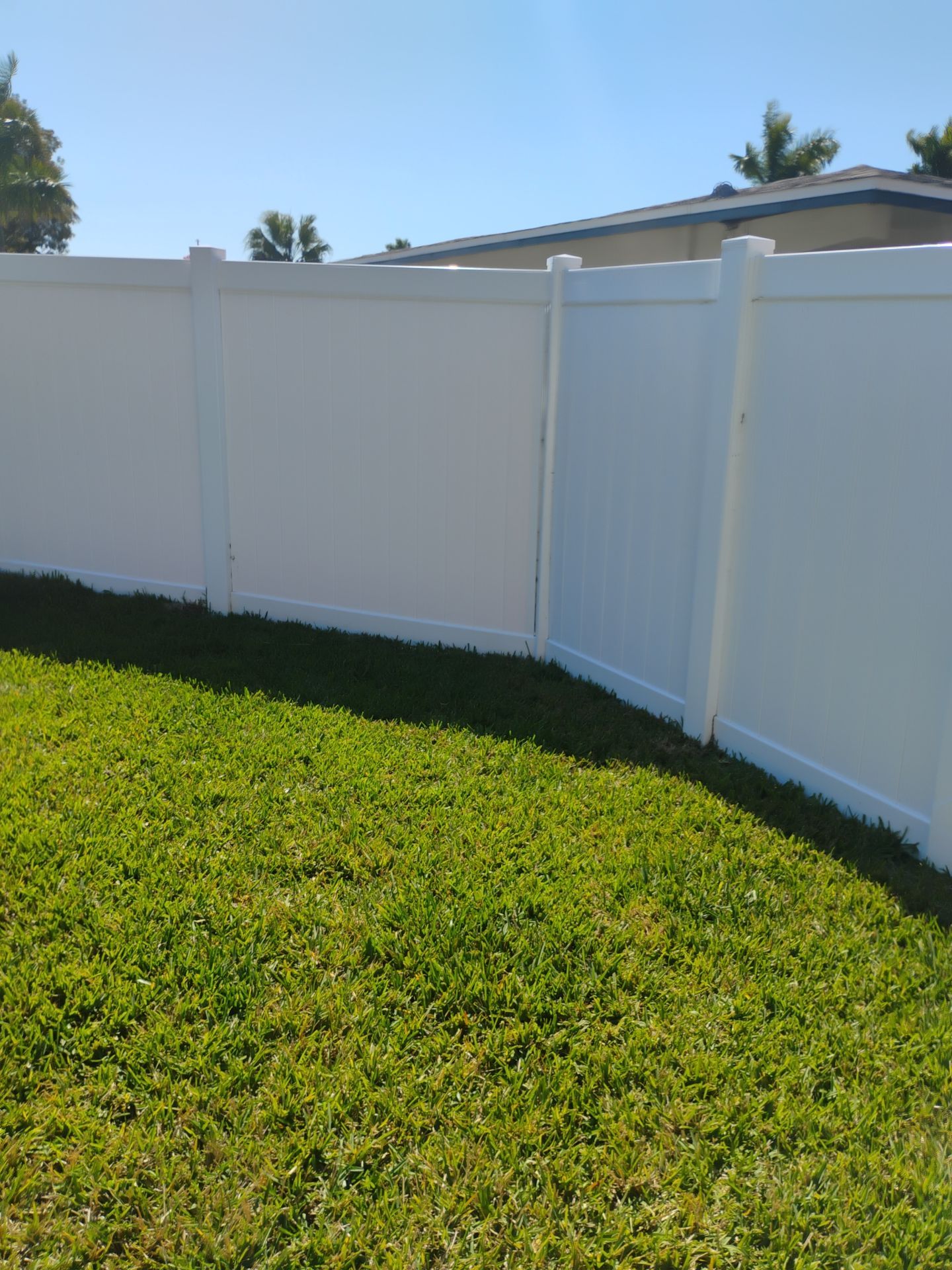 White Vinyl Privacy Fence and Double Gate Installation in Fort Myers by True Fence LLC