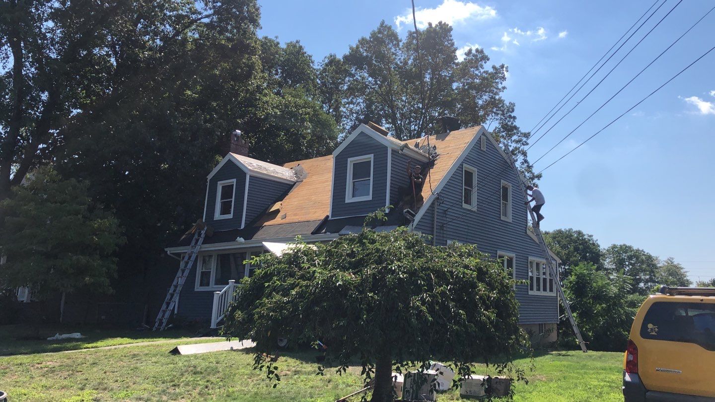 Residential Roofing Installation using Owens Corning Duration Slatestone Gray by A Plus Exterior