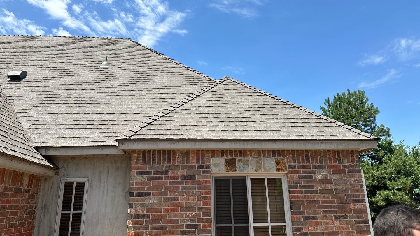 Roof Replacement and Gutter Installation in Edmond, OK by McCann's Roofing and Construction