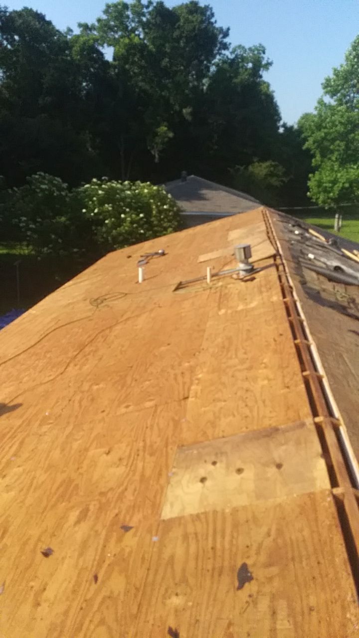 Residential Roofing Installation using Roof Replacement by American Roofing & Construction LLC