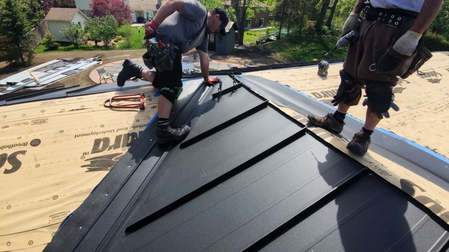 Residential Roofing Installation using 16" Standing Seam Panels by Jay Carter Roofing & Sheet Metal