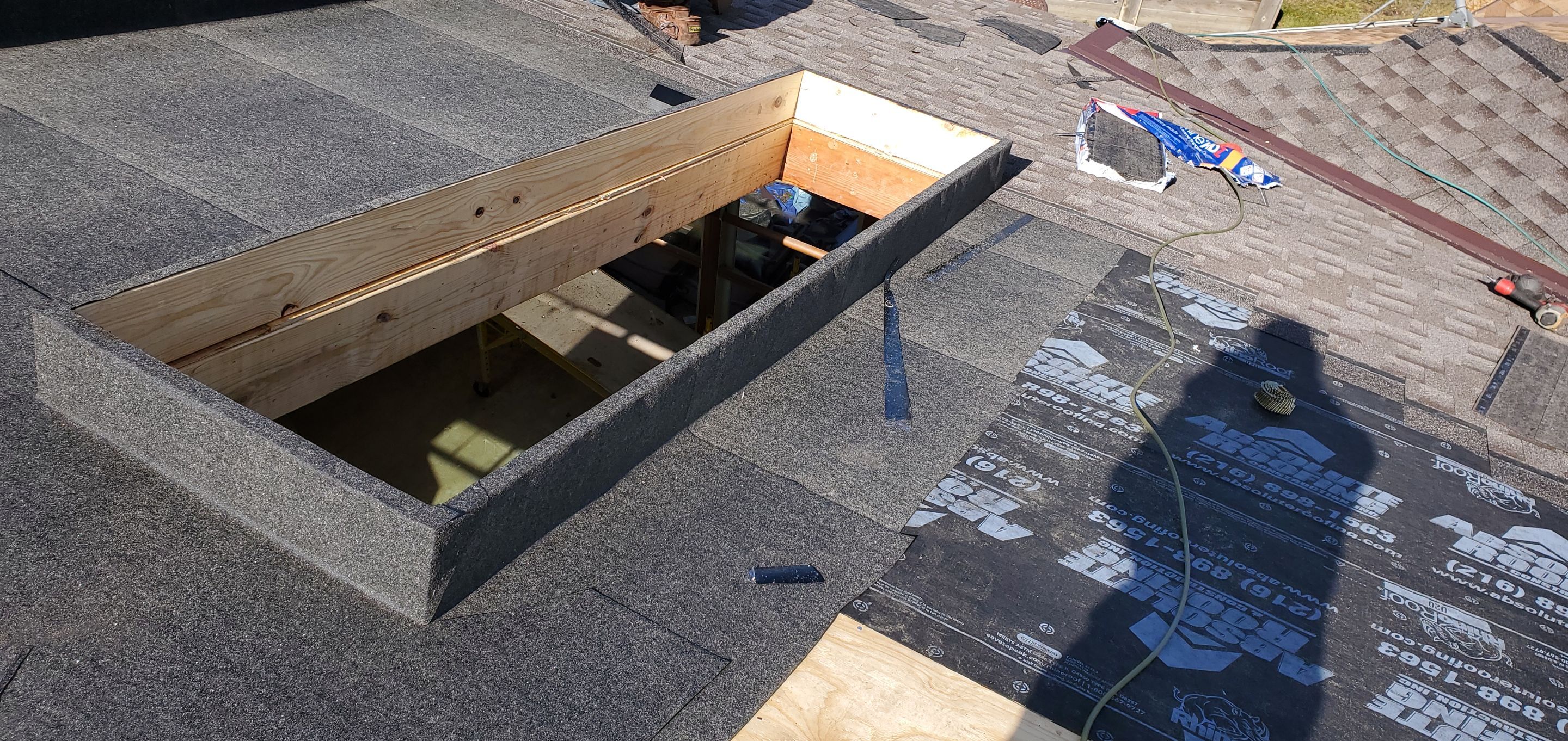 Skylight removal and install  by Absolute Roofing and Construction