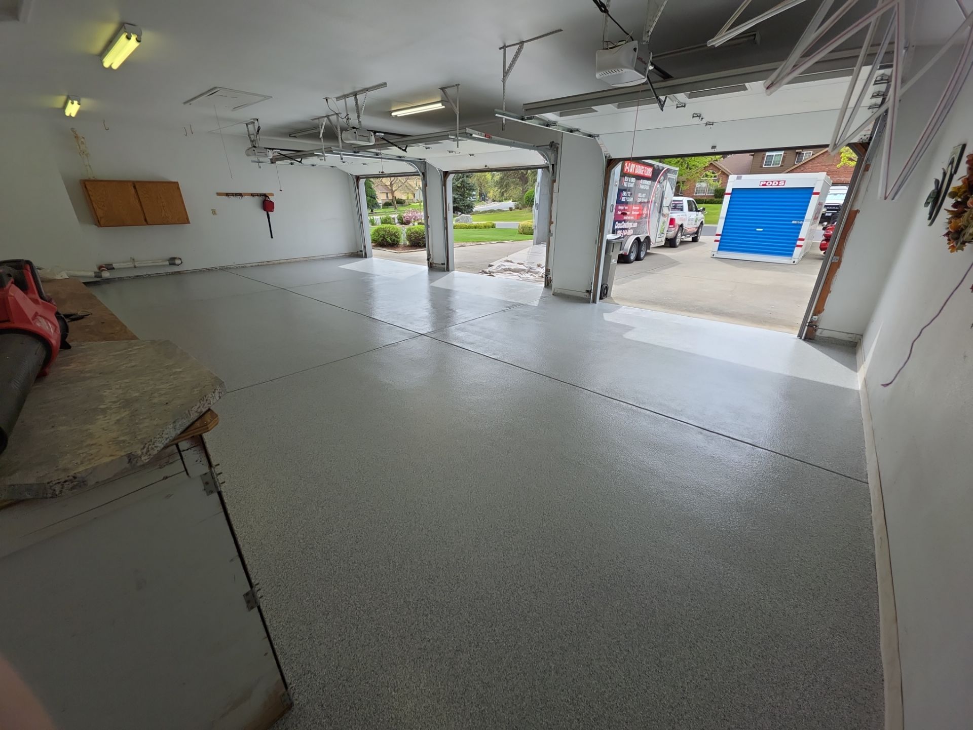 Garage Transformation using 1/8 Tidal Wave by Croc Coatings, LLC